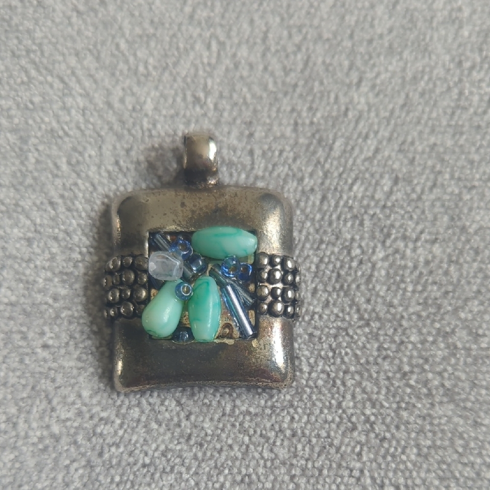 Rustic Silver Toned Pendant With Beaded Accents